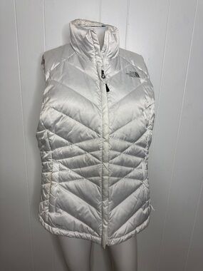 The north face puffer vest women’s L shimmery white